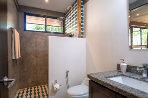Shower, hair dryer, towels, soap