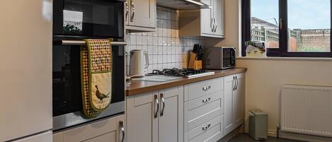 Dishwasher, highchair, cookware/dishes/utensils