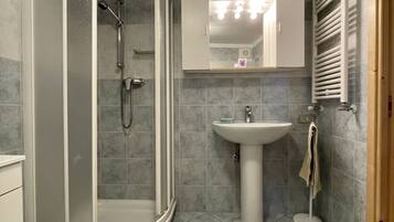 Hair dryer, bidet, towels, soap