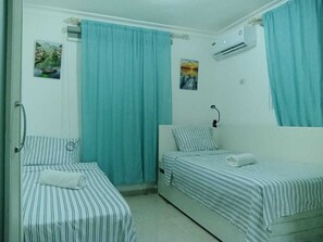 2 chambres, fer et planche à repasser, Wi-Fi gratuit, draps fournis