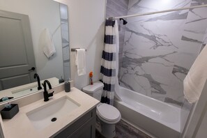 Hair dryer, towels, soap, shampoo
