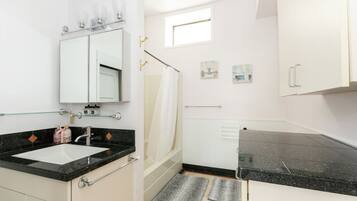 Hair dryer, towels, soap, shampoo