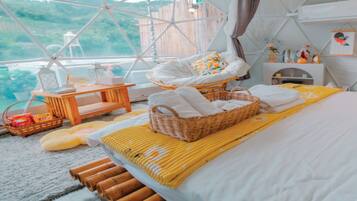 Deluxe Tent | Individually decorated, bed sheets