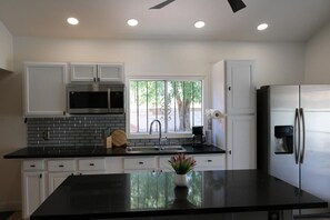 Fridge, microwave, coffee/tea maker, toaster