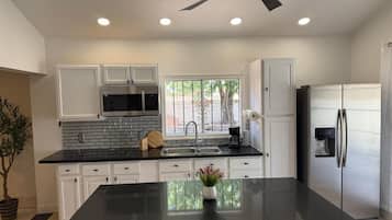 Fridge, microwave, coffee/tea maker, toaster