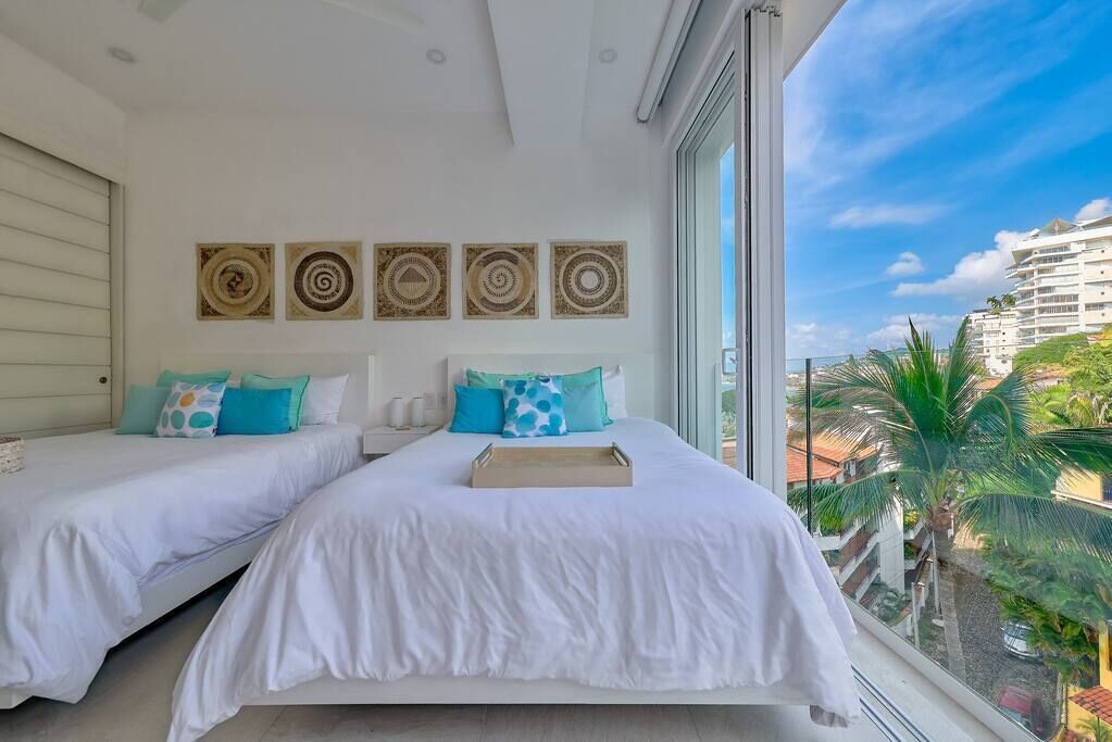 2 slaapkamers, een strijkplank/strijkijzer, reisbedje, wifi