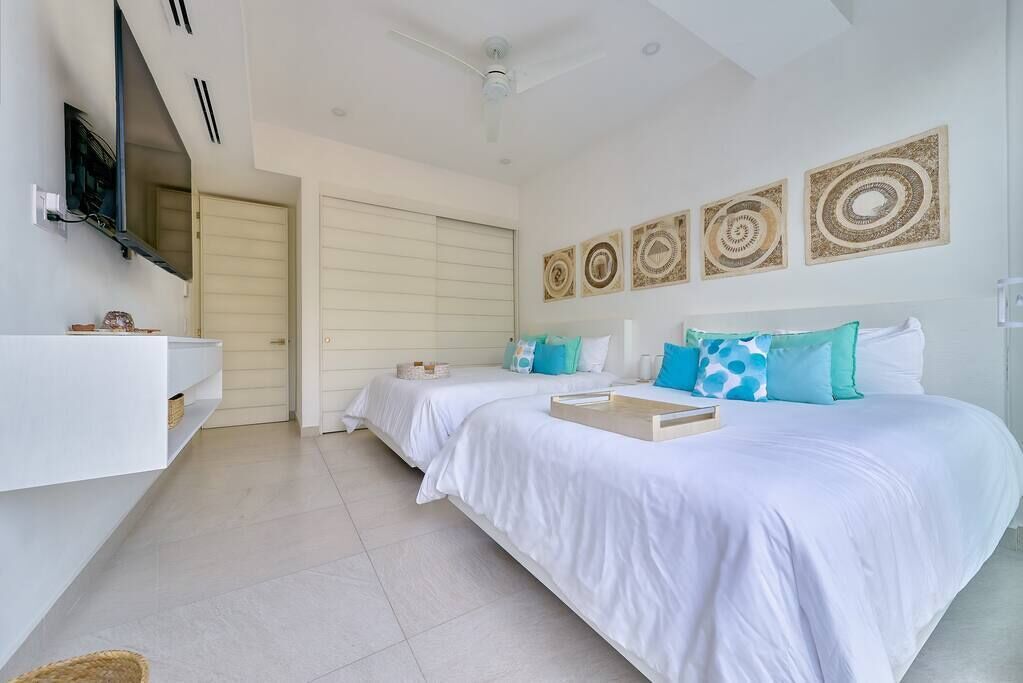 2 slaapkamers, een strijkplank/strijkijzer, reisbedje, wifi