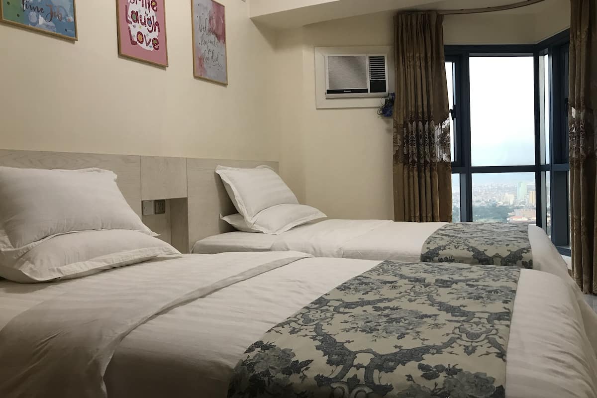 Apartemen Keluarga | 2 kamar tidur, setrika/meja setrika, dan Wi-Fi gratis