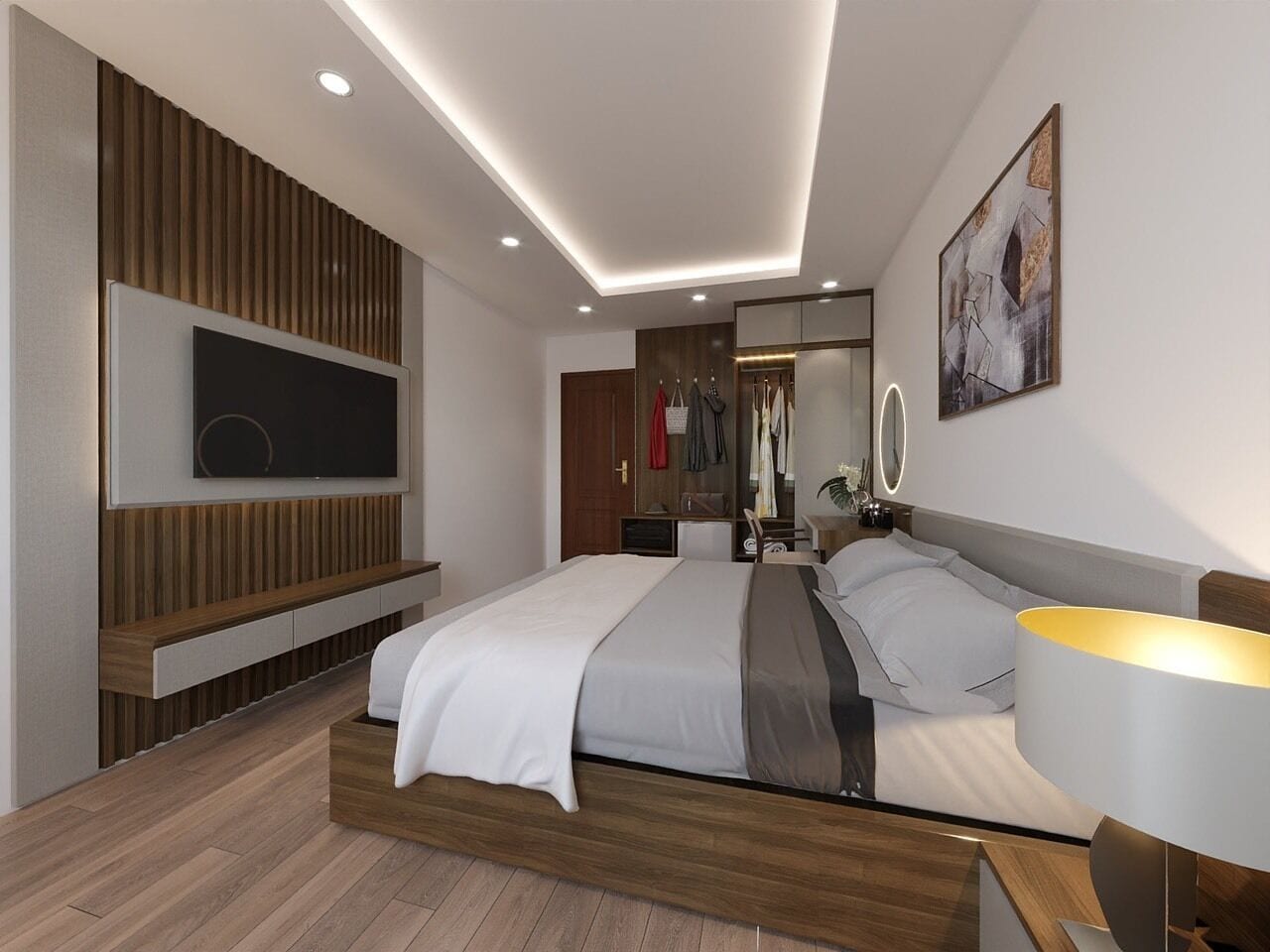 Una habitación de hotel moderna con una cama grande, televisor integrado, paneles de madera y un espejo sobre la cama.