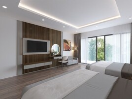 Habitación cuádruple Deluxe | Edredones de plumas, colchones viscoelásticos, mobiliario individual