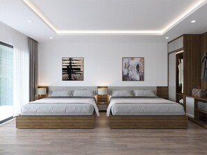 Deluxe-værelse til 4 personer | Dundyner, senge med madrasser af memory foam, individuel indretning