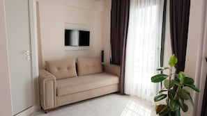 Chambre Deluxe double | Aire de séjour