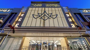 The exterior of the Ross Hotel with a prominent entrance, a modern design, and a clear view of the entrance area. - Ross Hotel  (Riyadh)