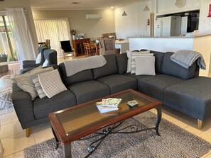 Smart TV, fireplace, foosball, books