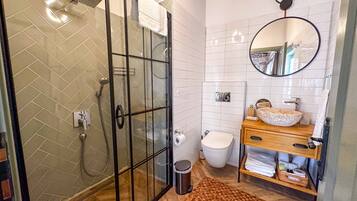 Family Villa | Bathroom | Rainfall showerhead, free toiletries, hair dryer, slippers