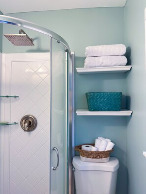 Shower, hair dryer, towels, soap