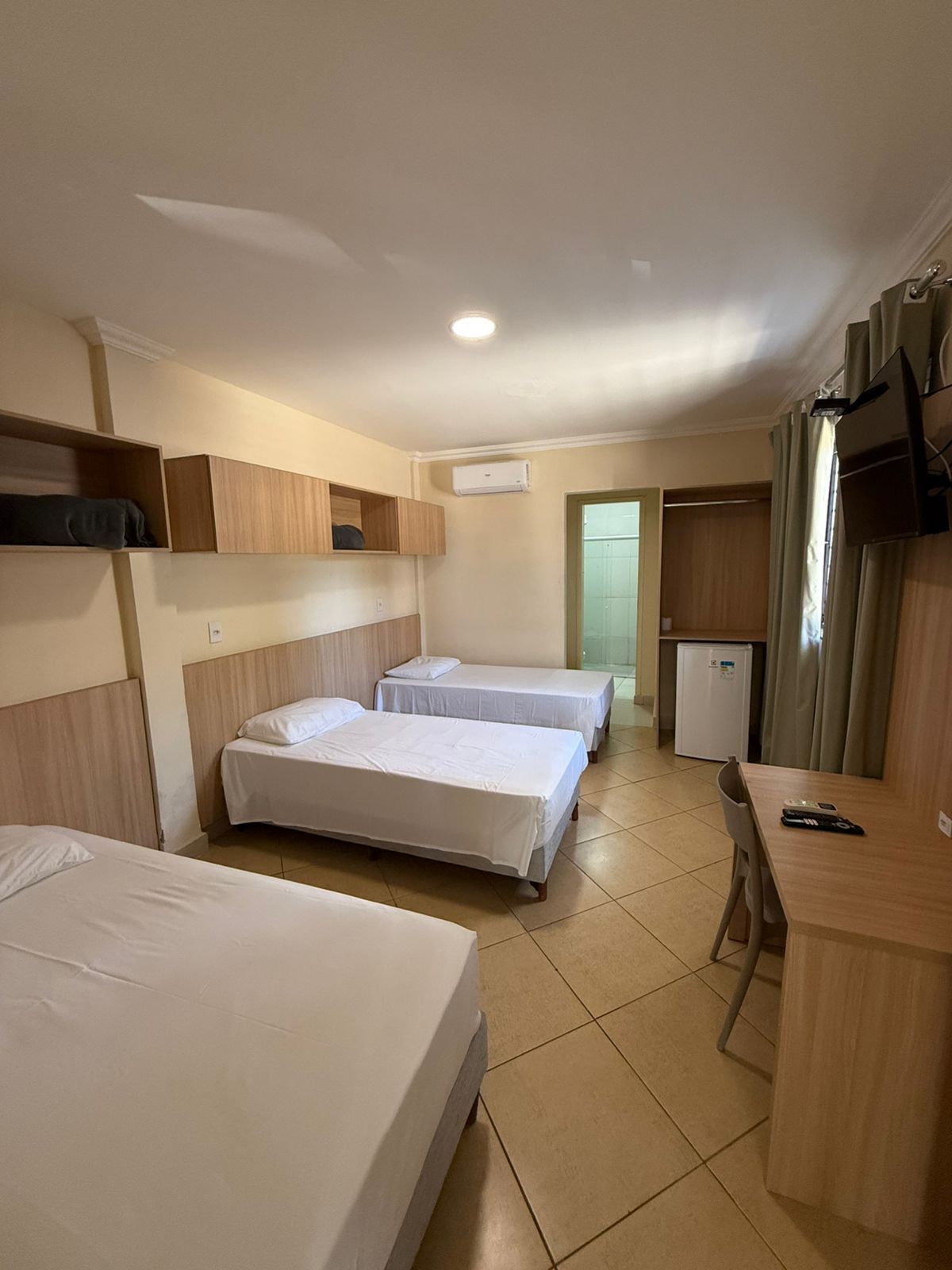 Triple Room, 3 Twin Beds, City View | Hypo-allergenic bedding, laptop workspace, free WiFi, bed sheets