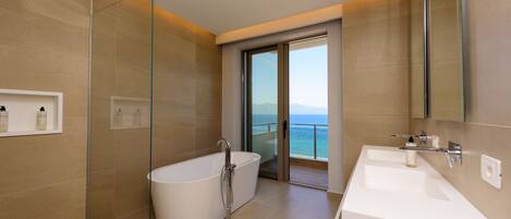 Junior Suite, Sea View | Bathroom | Slippers, towels