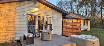 Wooded waterfront retreat with hot tub & fire pit