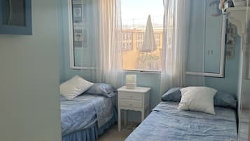 2 dormitorios, tabla de planchar con plancha, wifi y ropa de cama