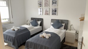 1 bedroom, desk, iron/ironing board, travel cot