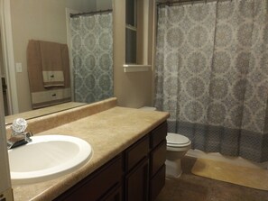 Hair dryer, towels, soap, toilet paper