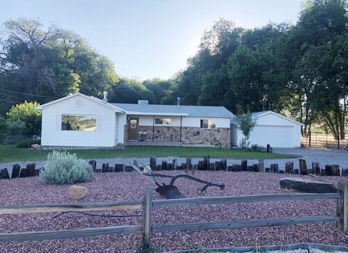 Farmhouse rancher with beautiful views, privacy and close to amenities/town!