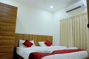 Habitación individual de lujo | Sábanas de algodón egipcio y ropa de cama de alta calidad
