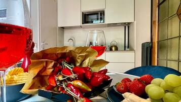 Executive Apartment | Private kitchenette | Full-sized fridge, cookware/dishes/utensils