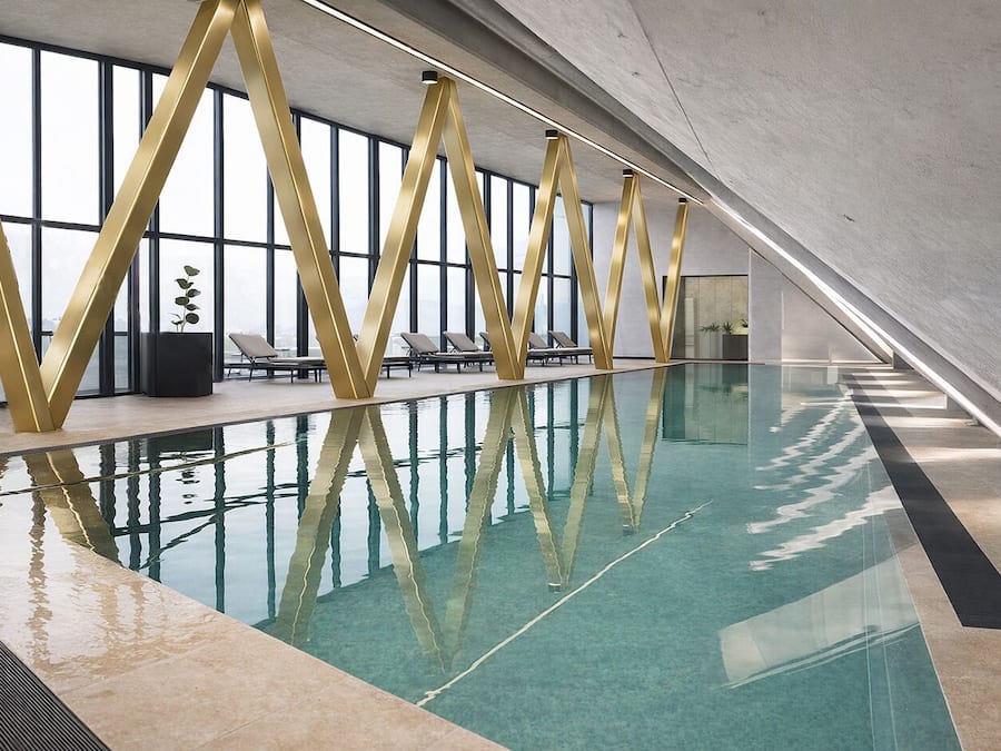 Indoor pool, open 7:00 AM to 10:00 PM, pool umbrellas, sun loungers