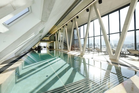 Indoor pool, open 7:00 AM to 10:00 PM, sun loungers
