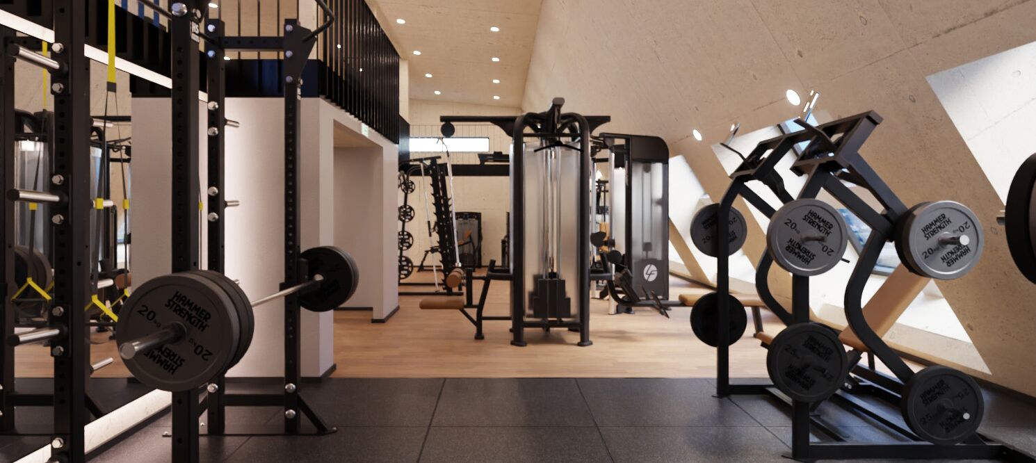 A gym with various weightlifting equipment, including barbells and weight plates.