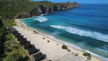 Private beach, white sand, sun loungers, beach volleyball