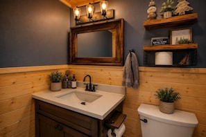 Bathtub, hair dryer, towels