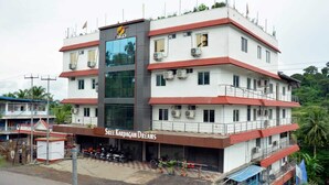 A multi-story building with a sign reading "Sree Kardagama Dreams." - Sree Karpagam Dreams (Port Blair)