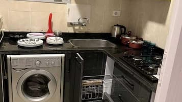Apartment | Private kitchen | Fridge, microwave, oven, stovetop