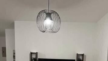 Apartment | Living area | 65-inch TV with digital channels