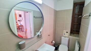 Standard Studio | Bathroom | Shower, towels, toilet paper