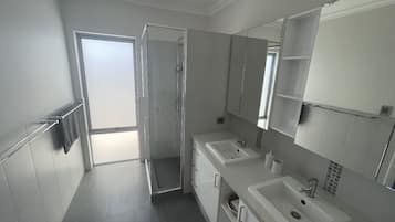 Jetted bath, hair dryer, towels, soap