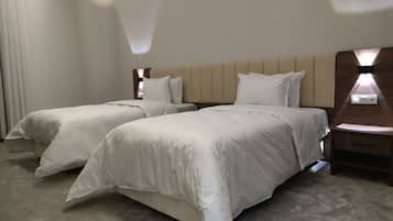 Kamar Double atau Twin Standar | Brankas, meja kerja, dan Wi-Fi gratis