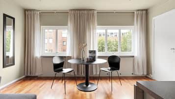Basic Apartment, 1 Queen Bed with Sofa bed, Non Smoking | Living area | 50-inch Smart TV with cable channels, heated floors