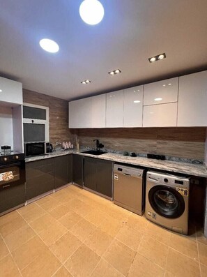 Apartment | Private kitchen | Fridge, microwave, oven, stovetop