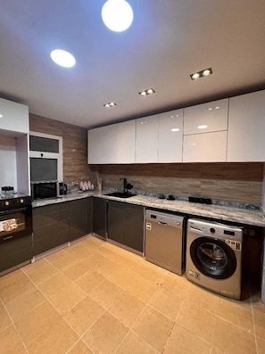 Apartment | Private kitchen | Fridge, microwave, oven, stovetop