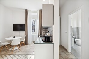 Two-Bedroom Apartment | Eget kjøkken | Kjøleskap, ovn, kokeplater og oppvaskmaskin