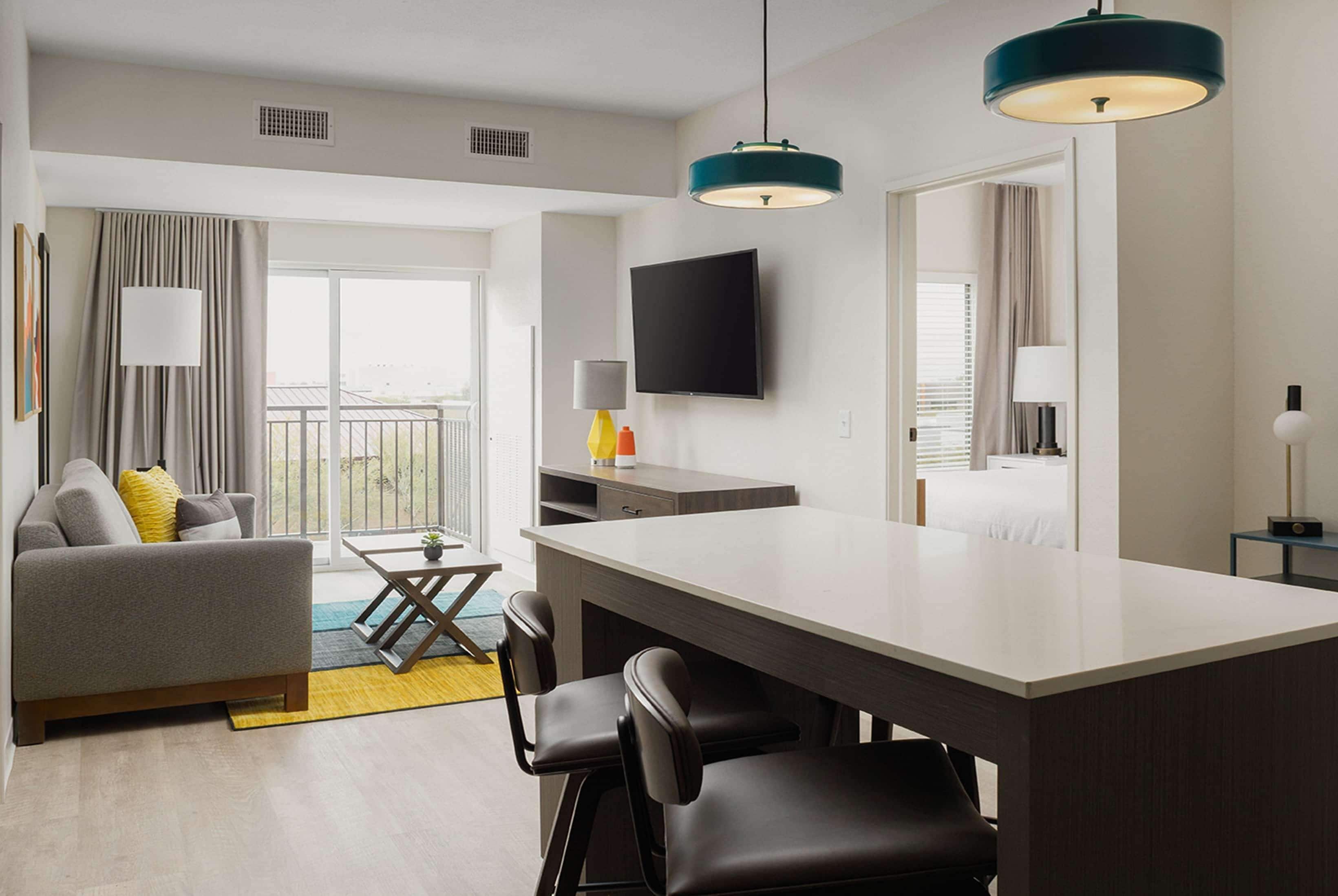 Premium bedding, laptop workspace, blackout drapes, iron/ironing board