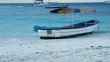 On the beach, white sand