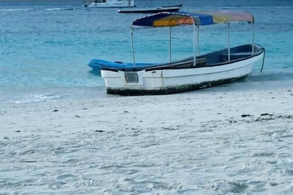 On the beach, white sand