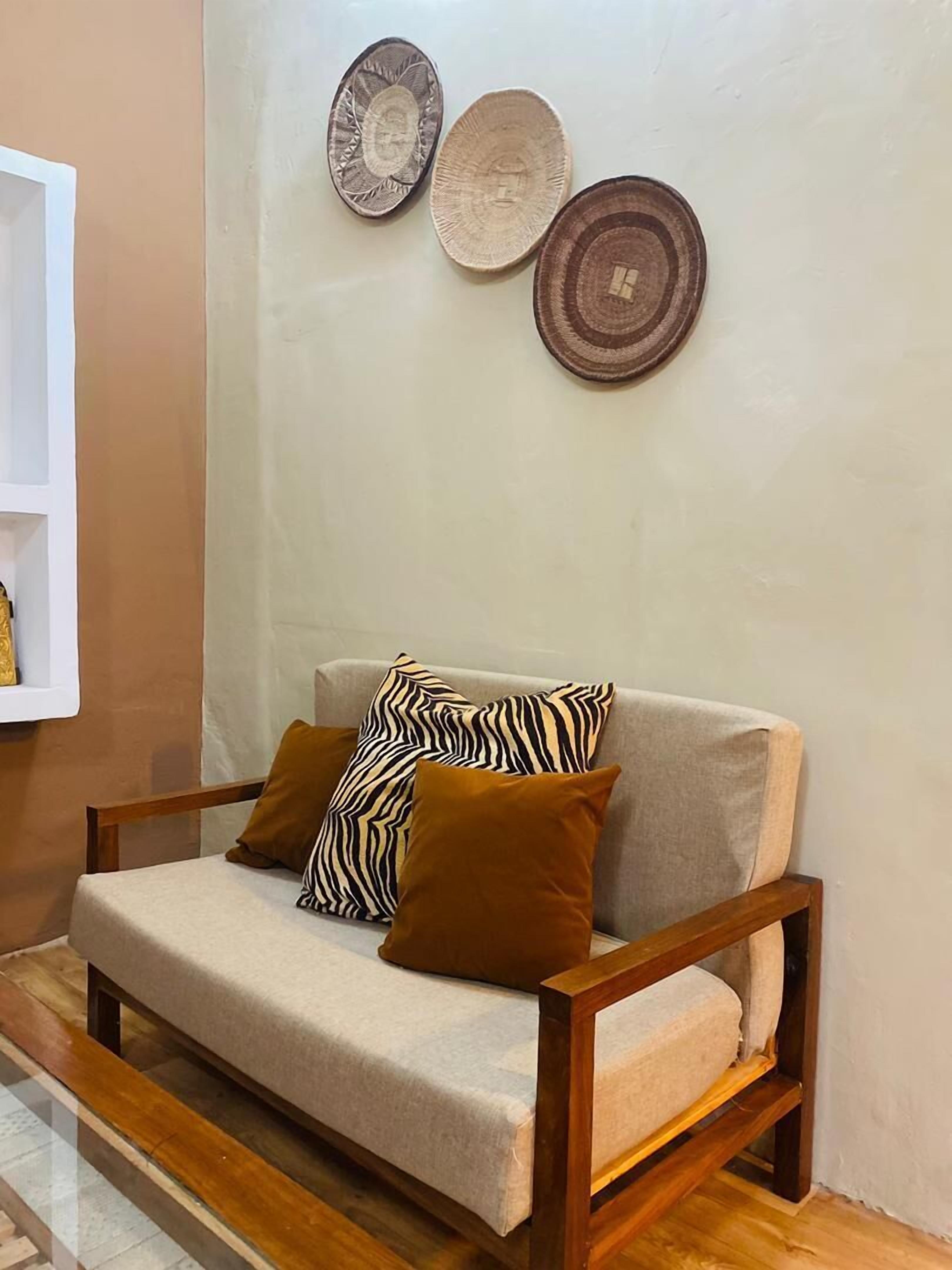 Casa Deluxe | Área de sala de estar | Televisión de pantalla plana y juguetes 