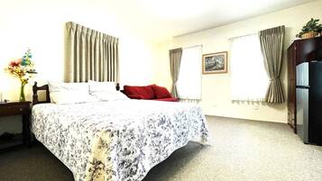 1 bedroom, desk, iron/ironing board, travel crib