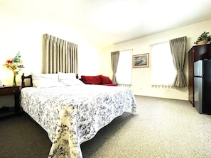 1 bedroom, desk, iron/ironing board, travel cot